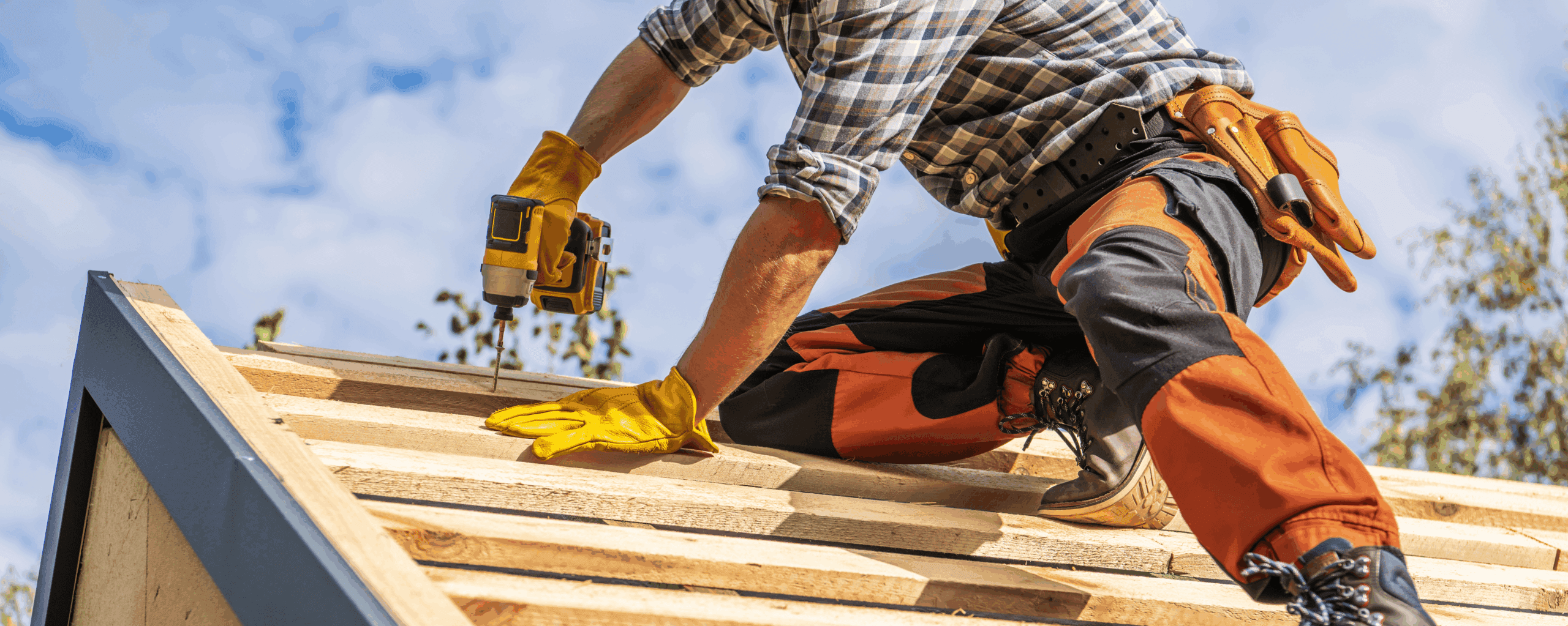 Man Working on a Roof