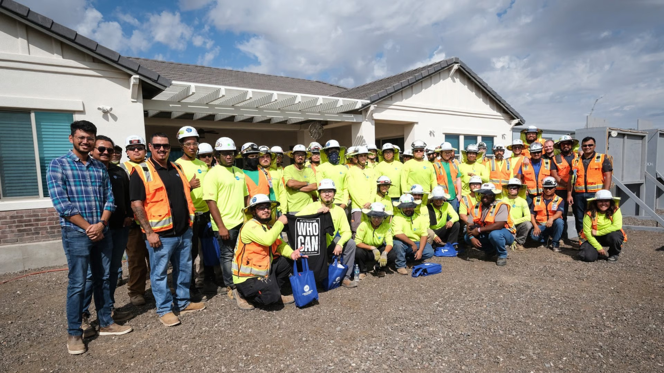 Canyon State Electric Employees Standing in front of construction project